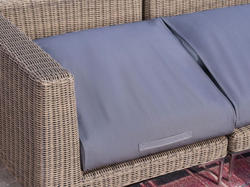 Detail shot of Outer's All-Weather Wicker outdoor furniture covered with the OuterShell cover
